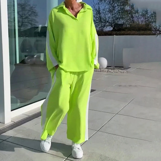 Színben összecsapó alkalmi felső és nadrág szett