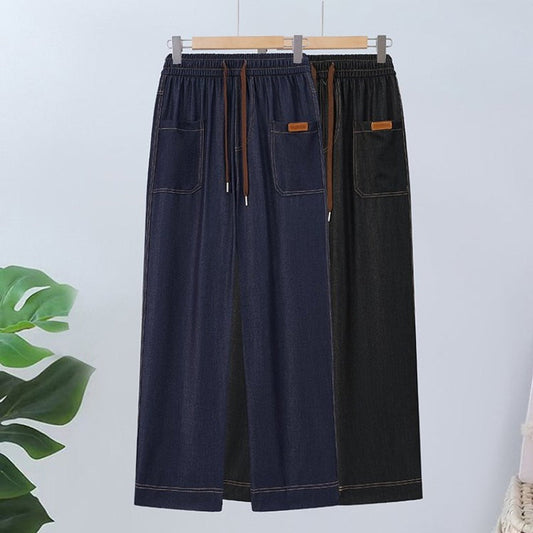 Húzózsinórral ellátott, magas derekú, egyenes szárú nadrág