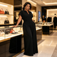 Női V-nyakú, széles szárú jumpsuit