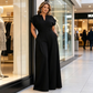 Női V-nyakú, széles szárú jumpsuit