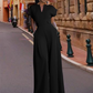 Női V-nyakú, széles szárú jumpsuit