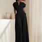 Női V-nyakú, széles szárú jumpsuit