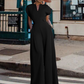 Női V-nyakú, széles szárú jumpsuit