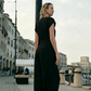 Női V-nyakú, széles szárú jumpsuit