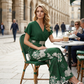 Elegáns V-nyakú, virágmintás, széles szárú jumpsuit