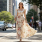 👗🌺 ELEGÁNS, VIRÁGOS MINTAZATÚ, PLISSZÉZETT MAXI RUHA
