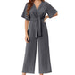 Női elegáns V-nyakú, széles szárú, derékpántos jumpsuit