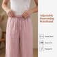 Laza szabású, zsinóros nadrág zsebekkel
